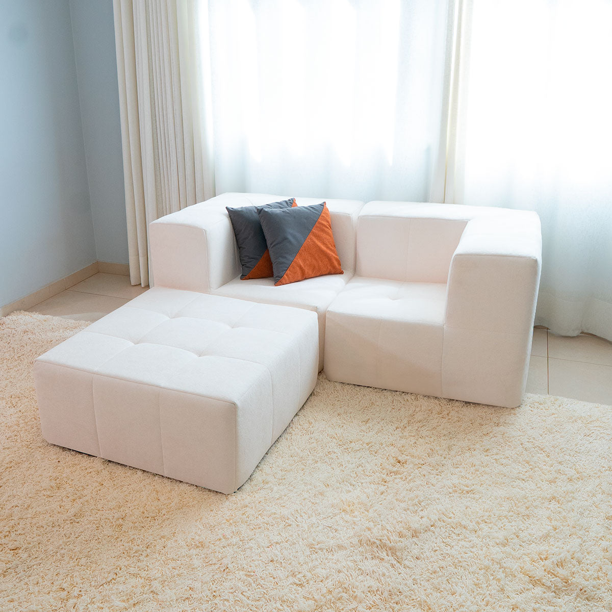 Sofá Modular 2 Lugares 2 Cantos com 1 Apoio de Pé em Boucle Bege