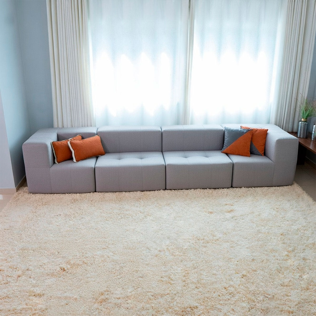 Sofá Modular 4 Lugares 2 Cantos com 1 Apoio de Pé em Boucle Cinza