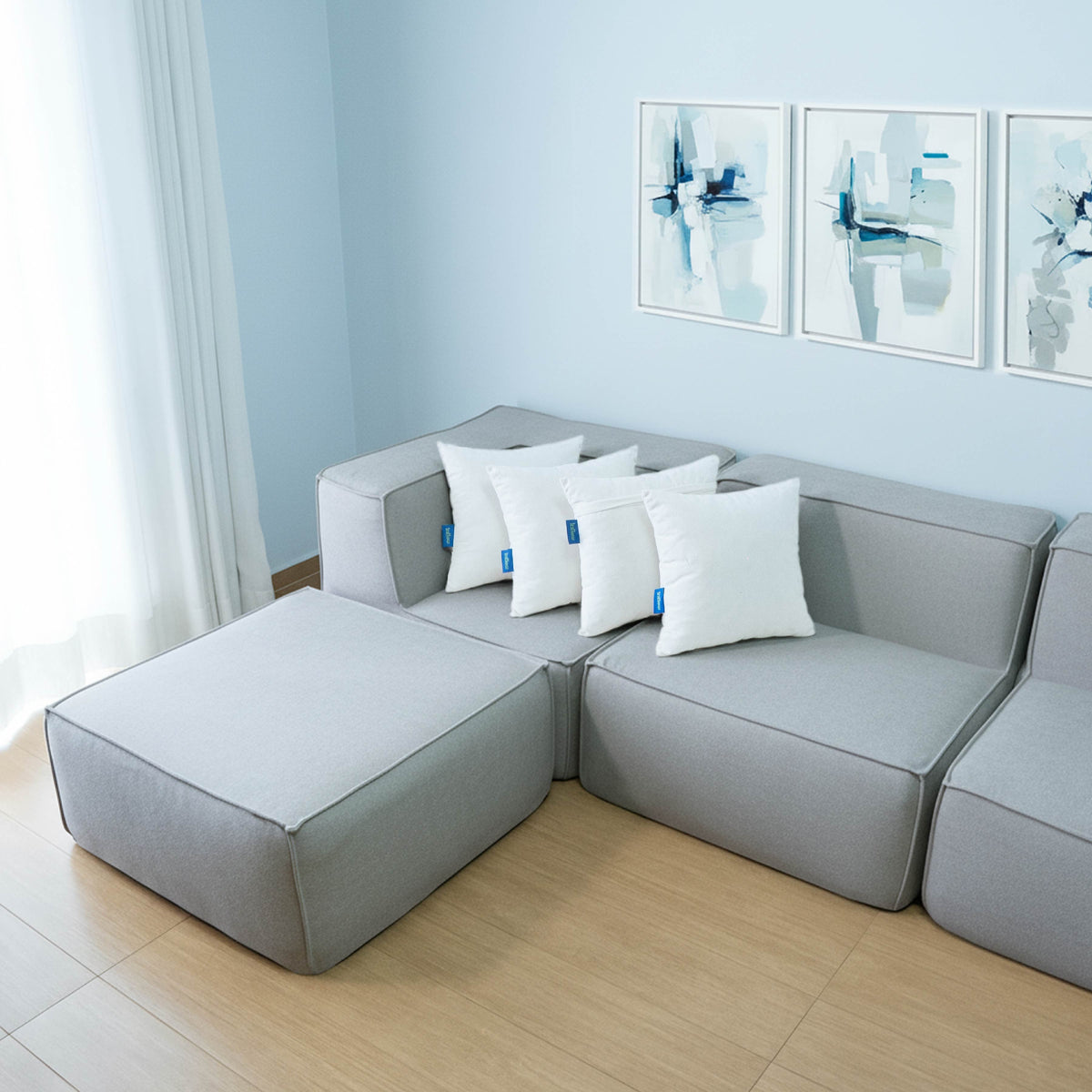 Sofá Modular Flow 3 Lugares 2 Cantos com 1 Apoio de Pé em Boucle Cinza